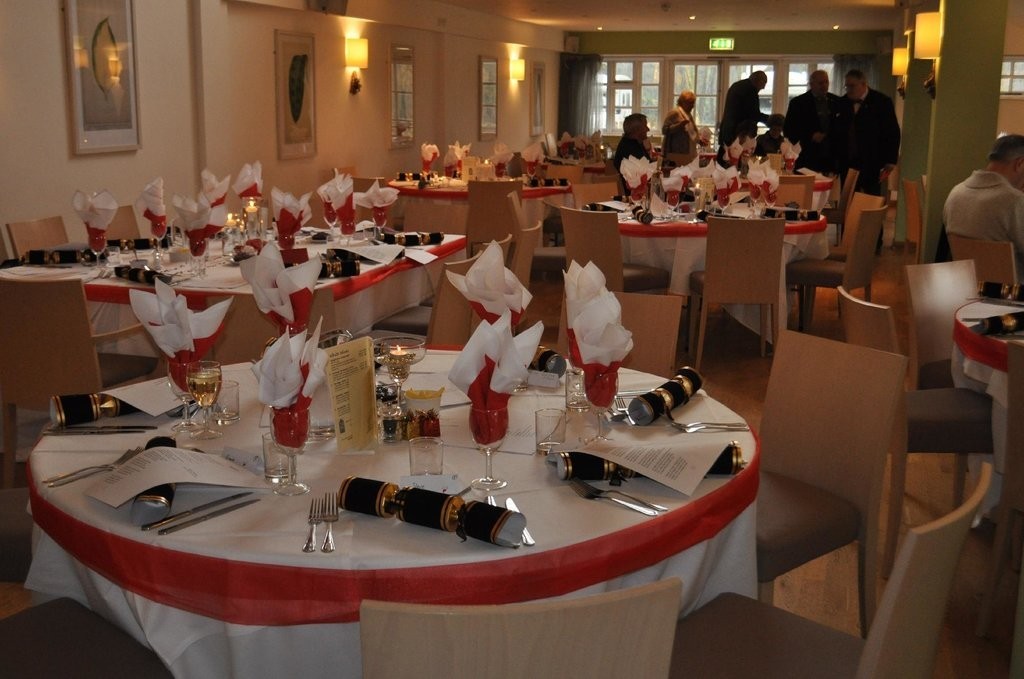 Folded napkins in wine glasses
