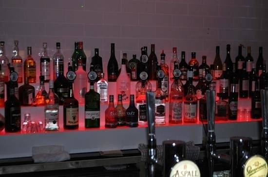 Bottles on a bar shelf