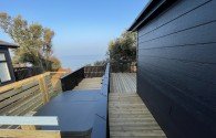'Pebble' Sea View Lodge with hot tub Thumbnail 4