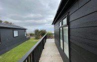 DIRECT SEA VIEW WITH BI-FOLD DOORS  2 bedroom Lodge Thumbnail 10